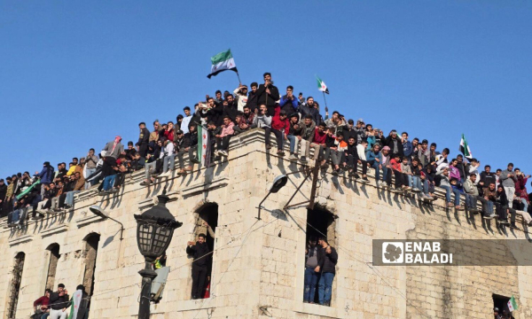 Syrians in Hama celebrate the fall of the Assad regime - December 13, 2024 (Enab Baladi/Iyad Abdul Jawad)