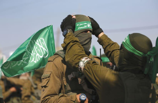 
HAMAS MEMBERS in Gaza.
(photo credit: REUTERS)
