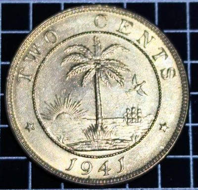 1941 Liberia 2 Cents: Reverse
Palm tree divides ship and sun within circle flanked by stars above date.

Script: Latin

Lettering:
★ TWO CENTS ★
1941