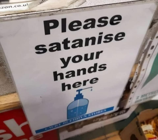 sign with a picture of a bottle of sanitizer that says:
"Please satanise your hands here"