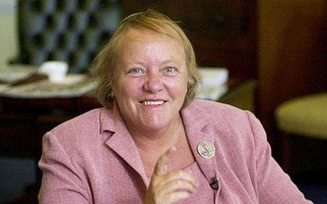 Photo of Mo Mowlam, a white woman with pale hair, in the late 1990s. 