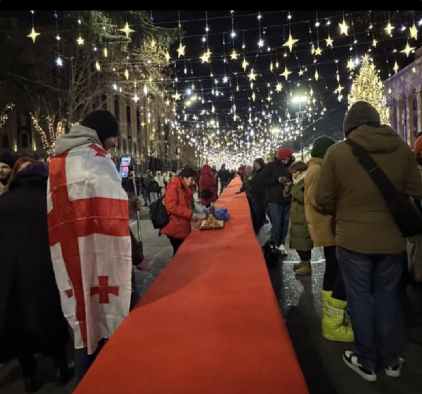 Supra feast table outside parliament in Tbilisi Georgia.