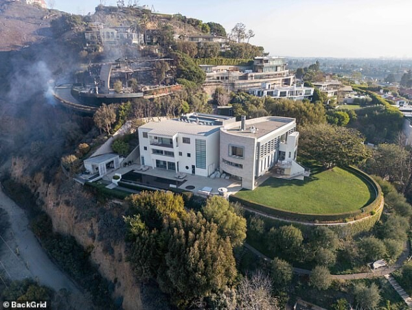 Tom Hanks' $26million home in the Pacific Palisades narrowly avoided the raging LA wildfire wreaking unimaginable havoc on the celeb-loved enclave; the home pictured Thursday