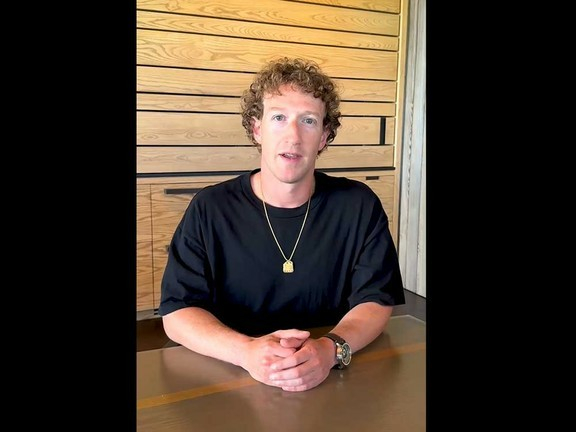 Mark Zuckerberg, wearing a $900,000 watch and a $5 perm!