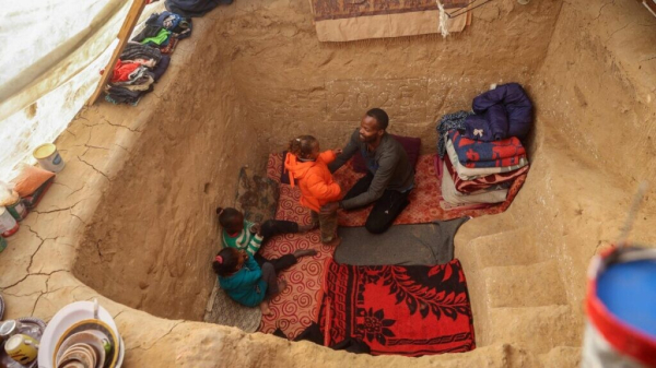 Displaced Gazan forced to live in hole to tackle winter, Israel's war