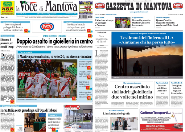 La foto mostra due pagine di giornali affiancate. A sinistra c'è "La Voce di Mantova" e a destra "Gazzetta di Mantova".   Sulla prima pagina de "La Voce di Mantova" si legge il titolo principale: "Doppio assalto in gioielleria in centro". Sotto ci sono immagini di una partita di calcio con il titolo: "Il Mantova parte malissimo, va sotto 2-0, ma riesce a rimontare".   Sulla prima pagina della "Gazzetta di Mantova" il titolo principale è: "Centro assediato dai ladri: gioielleria due volte nel mirino". C'è anche una grande immagine di un paesaggio al tramonto. Un altro titolo in evidenza è: "Testimoni dell'inferno di L'Aquila: 'Aiutiamo chi ha perso tutto'".  .