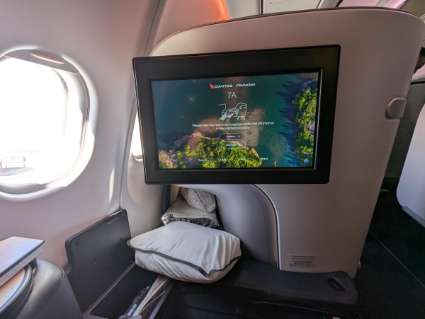 Photo of the large inflight entertainment screen of a Finnair business class seat.