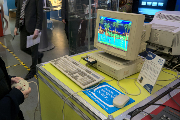 Photo of an Amstrad "Mega PC", with the original Sonic the Hedgehog game playing on the Sega Megadrive console inside the PC.