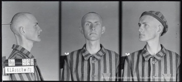 A mugshot registration photograph from Auschwitz. A man with a shaved head wearing a striped uniform photographed in three positions (profile and front with bare head and a photo with a slightly turned head with a hat on). The prisoner number is visible on a marking board on the left.
