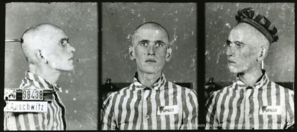 A mugshot registration photograph from Auschwitz. A man with a shaved head wearing a striped uniform photographed in three positions (profile and front with bare head and a photo with a slightly turned head with a hat on). The prisoner number is visible on a marking board on the left.