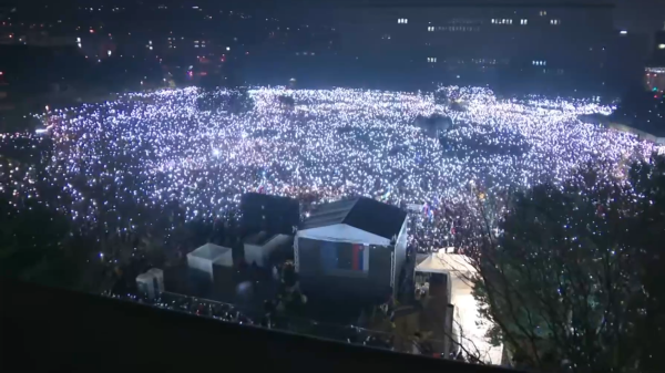 A huge night time crowd of protesters