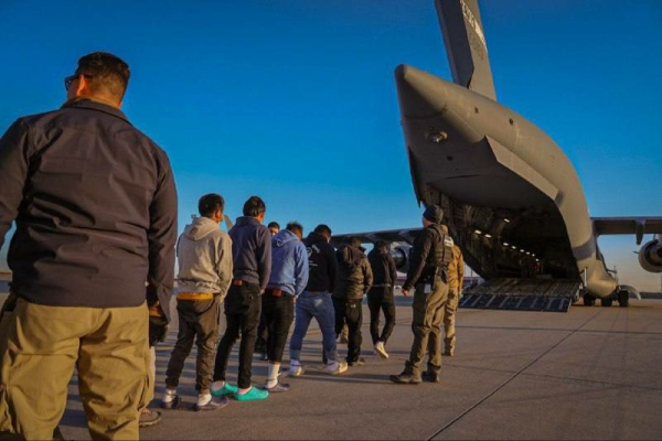 Immigrants last week being deported to locations unknown via military planes on airbases.