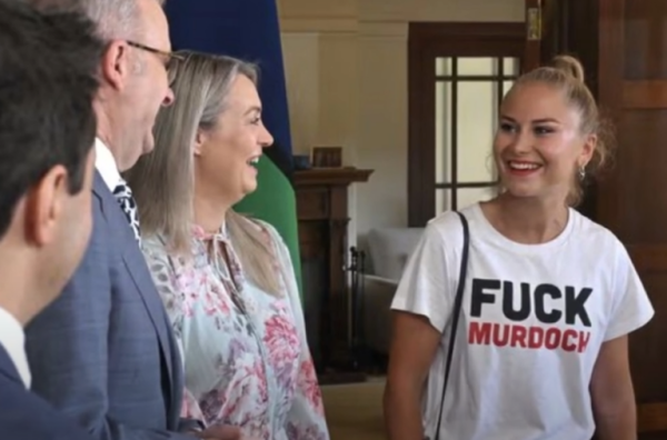 Australian Grace Tame wearing a 'Fuck Murdoch' t-shirt at an official political event.