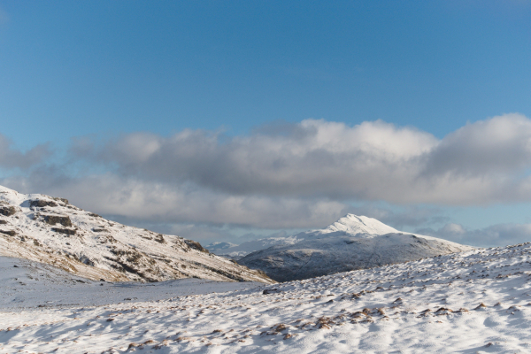 distant mountain with snow on a sunny day