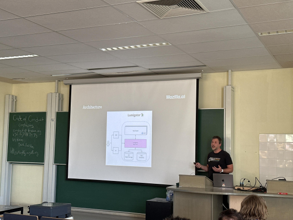 Davide Eynard is presenting about Lumigator at FOSDEM 2025