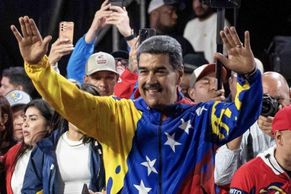 Venezuelan President Nicolas Maduro celebrates after partial results were announced by the electoral council, in Caracas, Venezuela in 2024. EPA-EFE/Ronald Pena R.