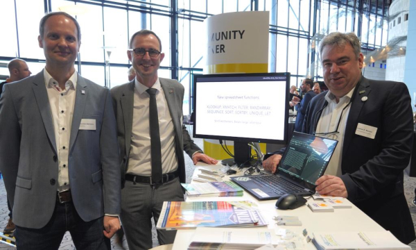 Photo of LibreOffice stand at Univention, with Dirk Schrödter, Schleswig-Holstein's Minister for Digitalisation