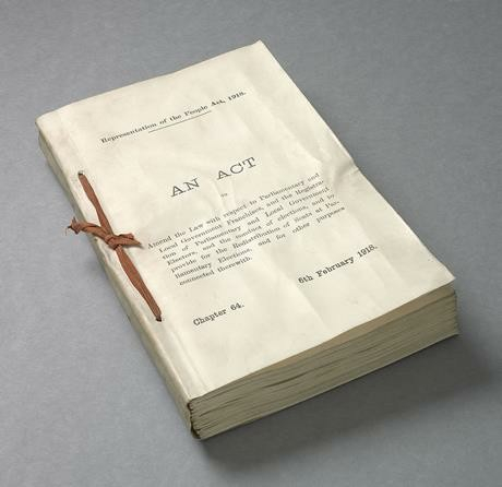 A paper copy of the Act, bound with ribbon.