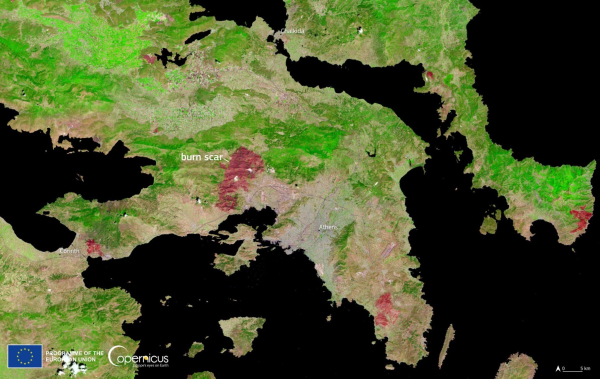 Satellite image showing several burn scars (red) throughout Greece.