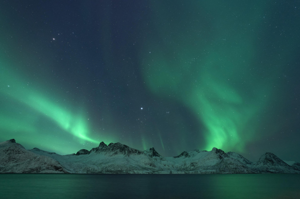 Just a mild aurora event on the island of Senja, near Tromsø in Arctic Norway. 