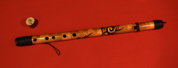 Wooden flute with black binding