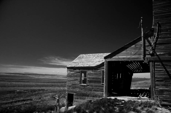 Ghost Town Okaton South Dakota in BW

Four guys from the Twin Cities of Minneapolis and St Paul, went to the South Dakota badlands for an early spring adventure. On our way out to the Bad Lands of South Dakota, Barry convinced us to stop off at Okaton, SD which is a ghost town.

Barry did the research ahead of time to see where the ghost towns will be in a 50 mile radius of our planned destinations.

Barry enjoyed this place a ton. I must say It was fascinating.

Okaton, South Dakota, is a small, abandoned ghost town located along U.S. Highway 14 in Jones County. Once a thriving railroad stop in the early 20th century, the town slowly declined as rail travel diminished and agriculture became less sustainable in the area. Today, Okaton is a fascinating roadside attraction for travelers seeking a glimpse into the past.

The town features a collection of weathered, decaying buildings, including an old general store, a schoolhouse, abandoned homes, and rusting farm equipment scattered across the landscape. Faded signs and peeling paint give the town an eerie, time-frozen atmosphere. 


Image:
https://fineartamerica.com/featured/ghost-town-okaton-sd-in-bw-wayne-moran.html

Read more:
https://waynemoranphotography.com/photography/south-dakota-badlands-photography/

#GhostTown #SouthDakota #Okaton #sd #bw #blackwhite #midwest #Badlands #Landscape #Photography #Travel 

#AYearForArt #buyintoArt #fineart #art