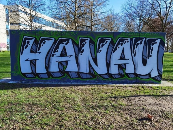 "Hanau" painted on a wall with spray paint 