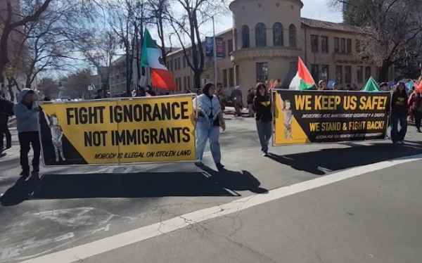 Banner in the street during march. 