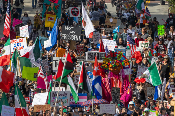 People protest against Donald Trump on 17 February in Los Angeles, California. Photograph: David McNew/Getty Images