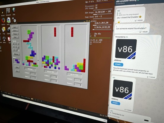 a large screen, running "damn small linux" graphical user interface with the "tetris" game running in foreground.  On the same screen there is a chat interface where the webxdc "v86" was started from a chat message bubble. 