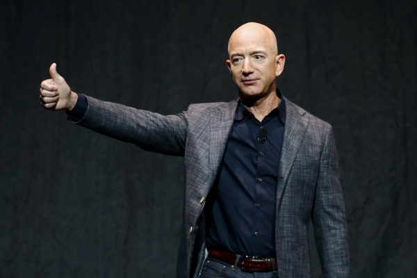 The owner of the Washington Post, Jeff Bezos (shown here in May 2019), announced on Wednesday that the paper’s opinion pages would “be writing every day in support and defense of two pillars: personal liberties and free markets” — a revamp that prompted Opinion Editor David Shipley to resign. | Patrick Semansky/AP 