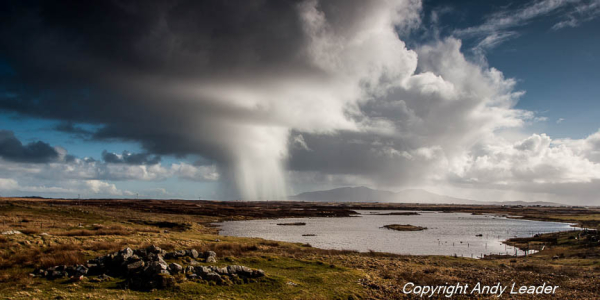 Lochan on Benbecula with a very isolated, dramatic shower dropping from the sky.