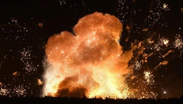 A car bomb explodes in a massive fireball killing the occupant (Russian FSB officer) instantly