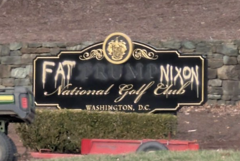 The sign at the entrance to one of 47's golf clubs has been defaced, to read FAT NIXON (instead of TRUMP) NATIONAL GOLF CLUB WASHINGTON DC