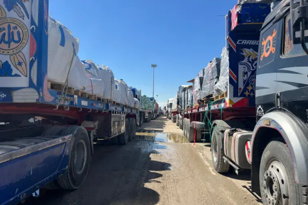 Trucks line up at the Egyptian side of the Rafah border crossing between Egypt and the Gaza Strip after Israel blocked the entry of aid trucks into Gaza, Sunday, March 2, 2025 [Mohamed Arafat/AP]