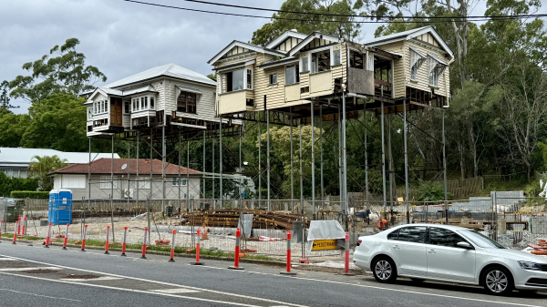 Houses, up on stilts. They must be about ten meters high.