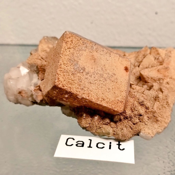 Large, beige calcite crystal