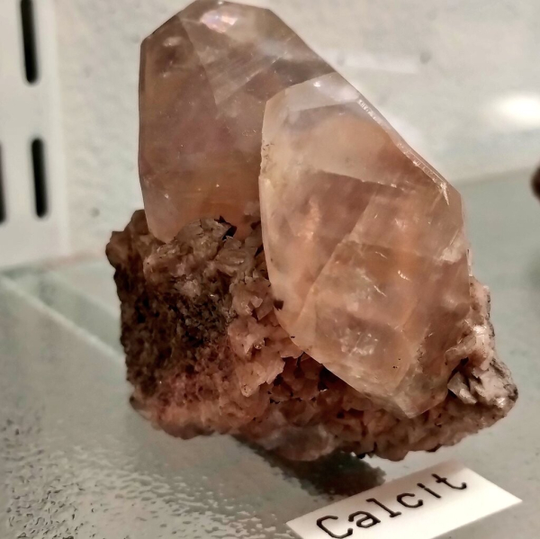 Large, slightly purple calcite crystal