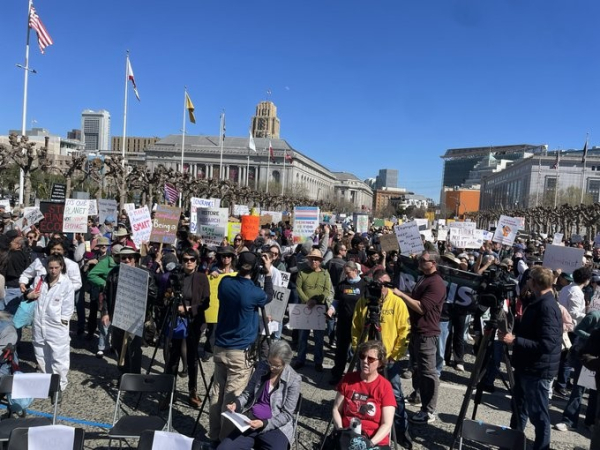 Huge crowd of protesters with placards in San Francisco