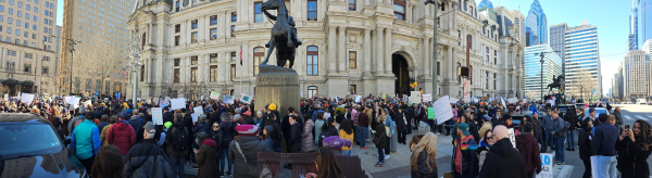 Huge crowd of protesters with placards