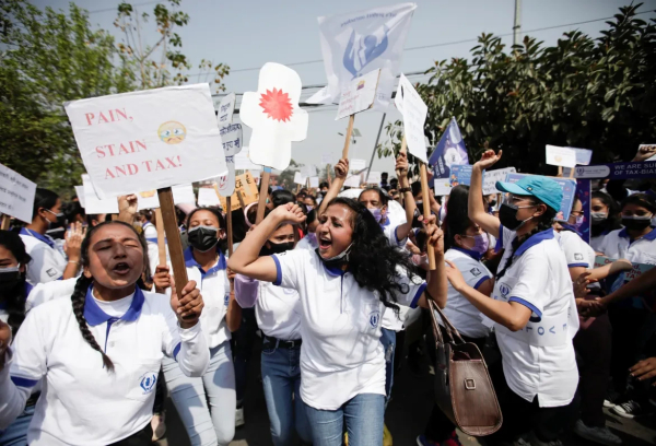 Huge crowd of protesters with  placards in Kathmandu