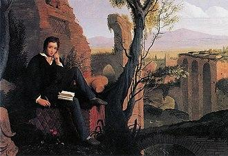 Posthumous Portrait of Shelley Writing Prometheus Unbound in Italy-painting by Joseph Severn, 1845.

Oil on canvas. Keats-Shelley Memorial House, Rome, Italy.

This romantic and idealized portrait shows the English poet Percy Bysshe Shelley seated among the ruins of an ancient structure.

Shelley is portrayed in a contemplative and slightly melancholic posture, with his hand resting on his face, gazing into the distance.